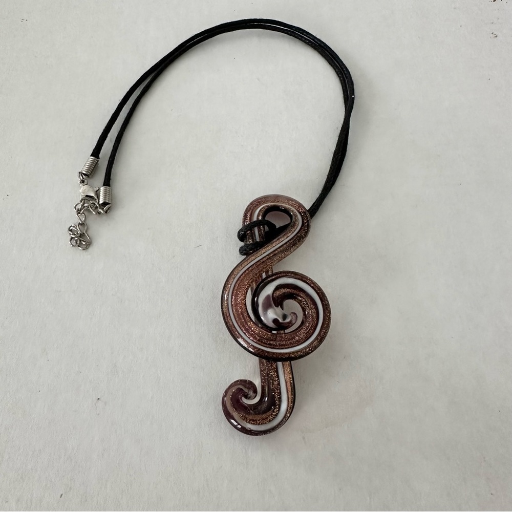 Music key glass pendant on the string necklace